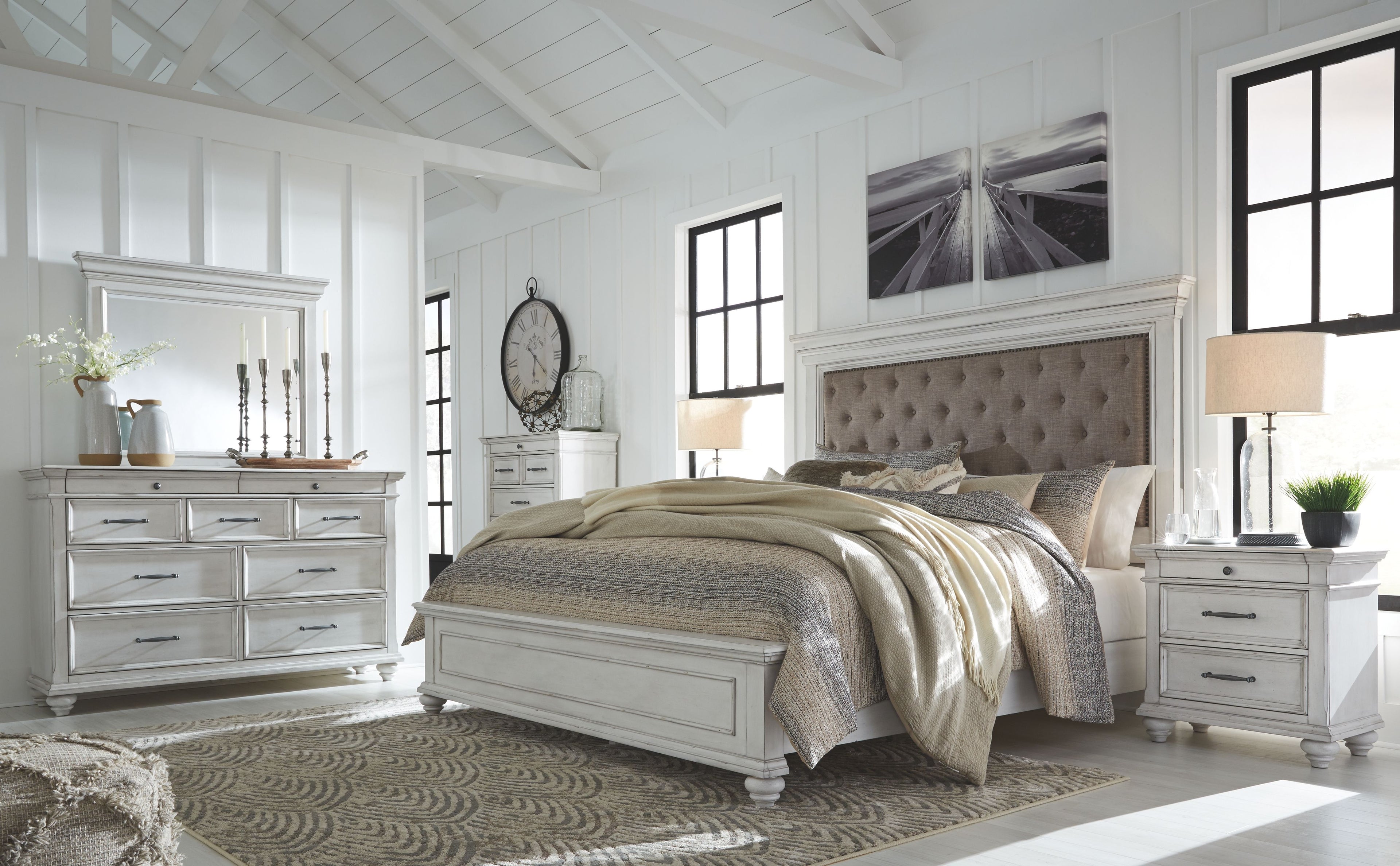 Upholstered bedroom set by Kanwyn: tufted headboard bed with dresser, mirror, and matching nightstands