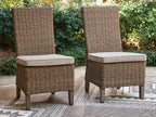 Pair of beige woven side chairs with thick seat cushions on square tapered legs
