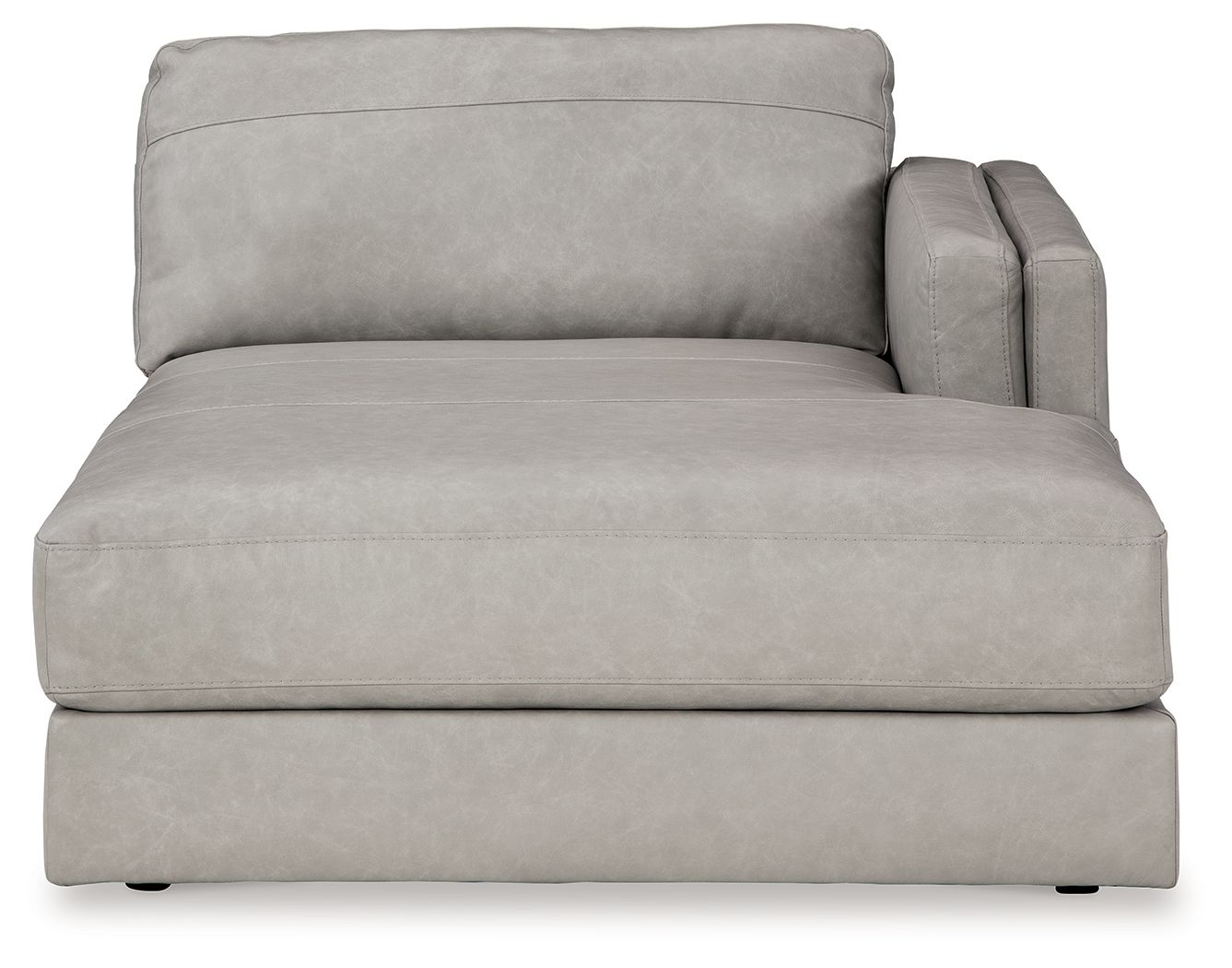 Light gray upholstered corner chaise with rounded back and track-style arms