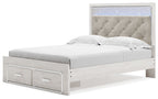 Panel bed with upholstered headboard and white frame; footboard storage drawers