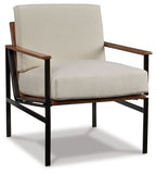 Tilden accent chair in ivory with wide arms and cushioned seat, brown frame details