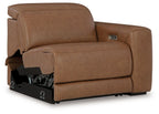 Caramel power recliner with upholstered arms and visible power mechanism under seat