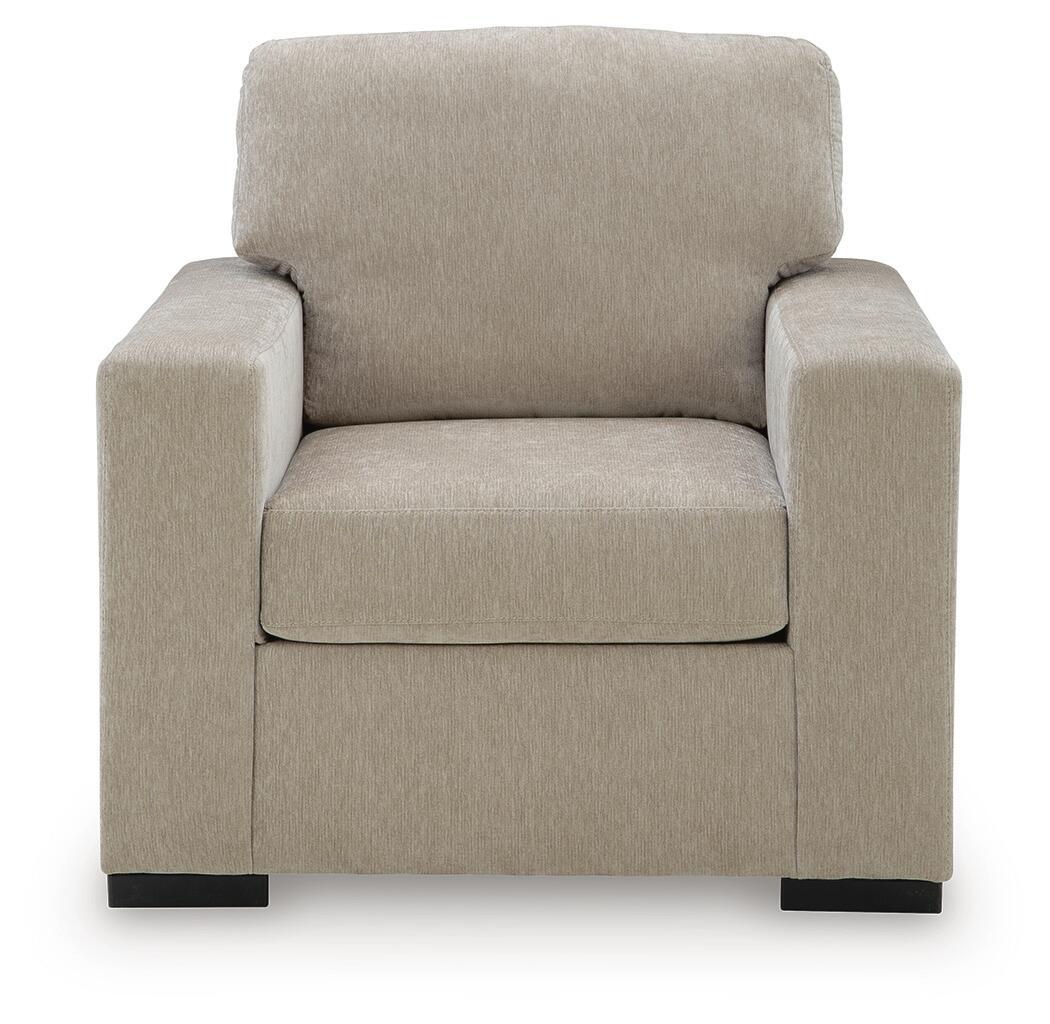 Light gray upholstered accent armchair with square arms and cushioned backrest