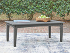 Gray outdoor cocktail table with slatted top, holding a fruit tray