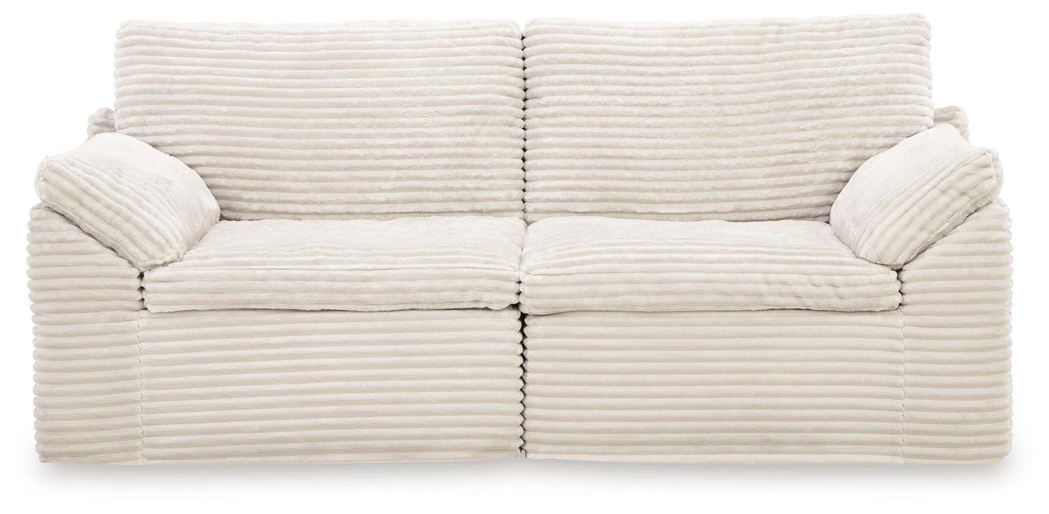 Ivory corduroy corner chair with two seat cushions and button-tufted arms
