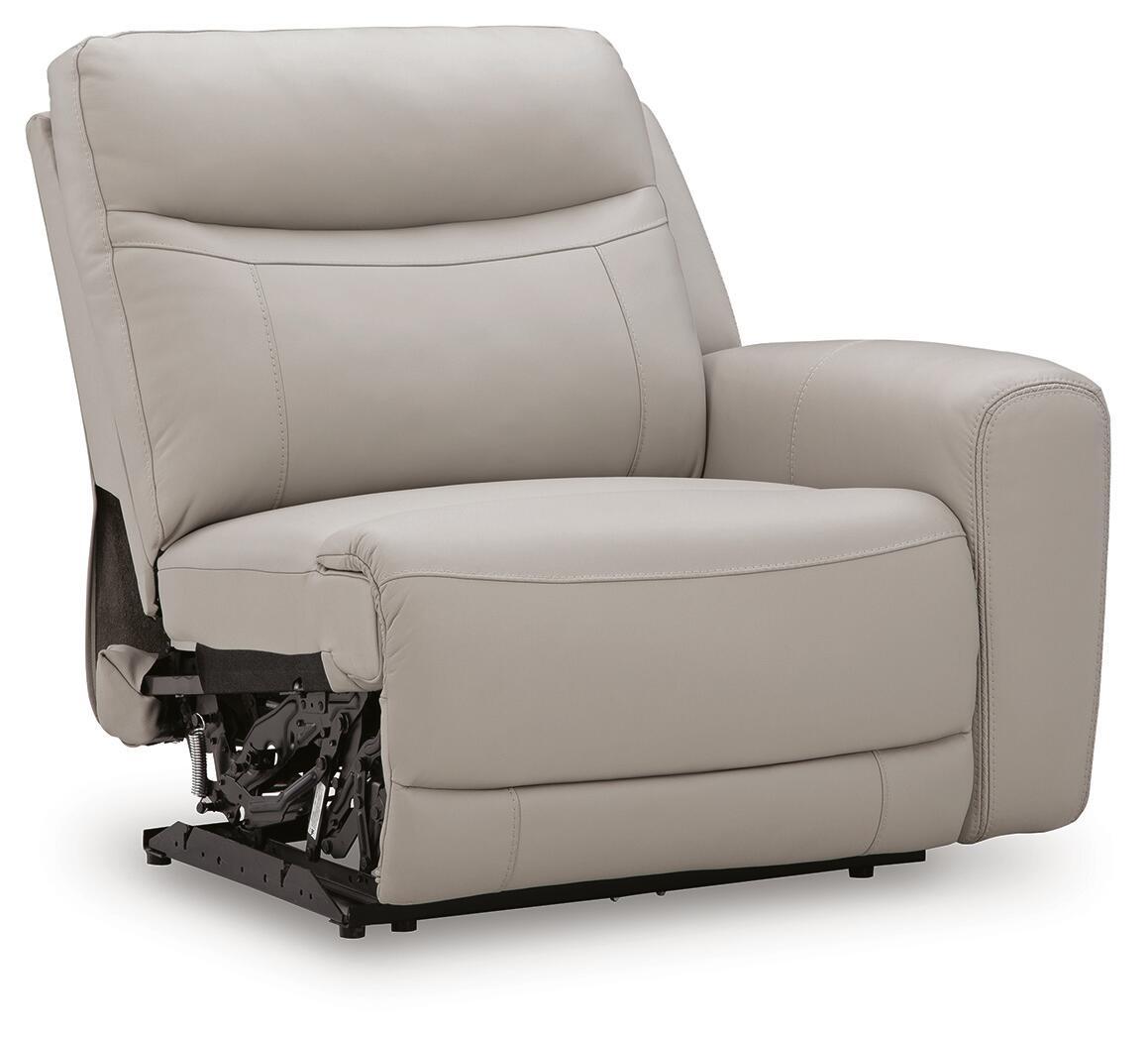 Gray power recliner chair with visible power mechanism under seat and padded arms