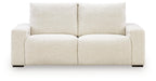 White power reclining sectional sofa with padded arms and two cushioned seat sections