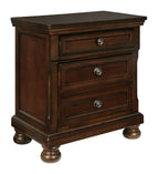Dark brown two-drawer night stand with round metal pulls on each drawer