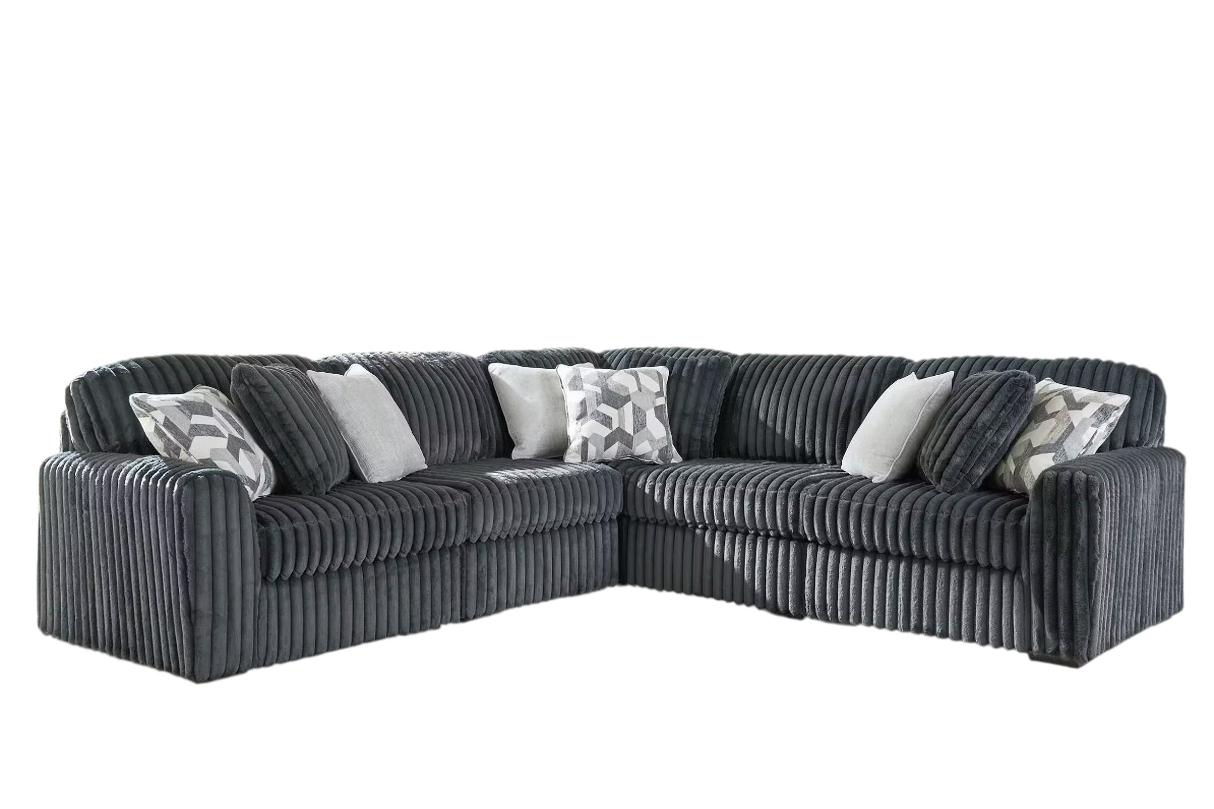 Charcoal L-shaped sectional sofa with corner chaise, striped upholstery, and patterned pillows.