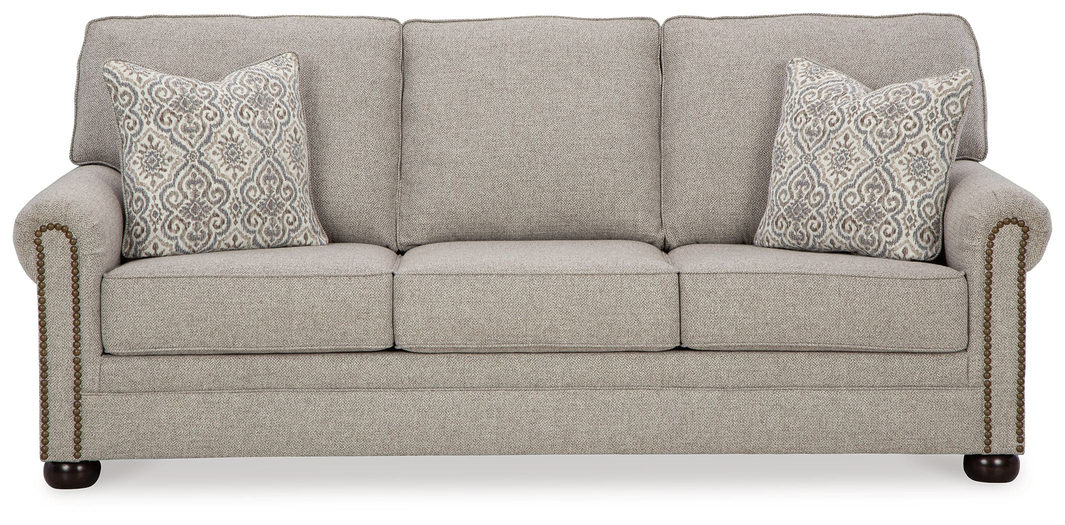 Queen sofa sleeper in light gray fabric with two patterned accent pillows and rolled arms