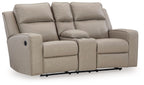 Pebble reclining loveseat with console, padded arms and three seat back cushions.