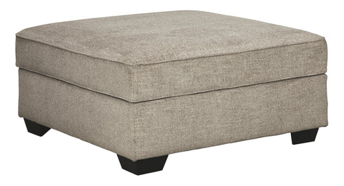 Stone beige storage ottoman with hinged lid and black legs