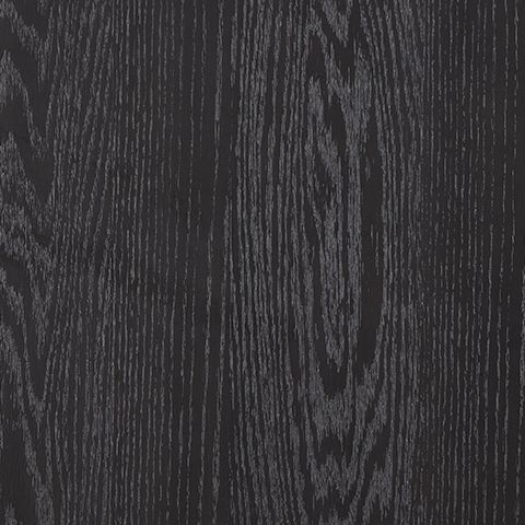 Close-up of dark woodgrain finish on a cocktail table surface