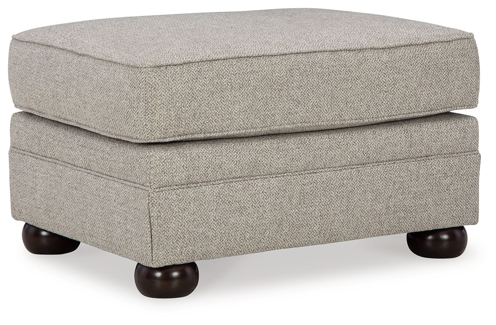 Light beige upholstered ottoman with padded hinged lid and dark wooden legs