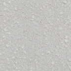 Ivory boucle upholstery fabric close-up with dense looped texture