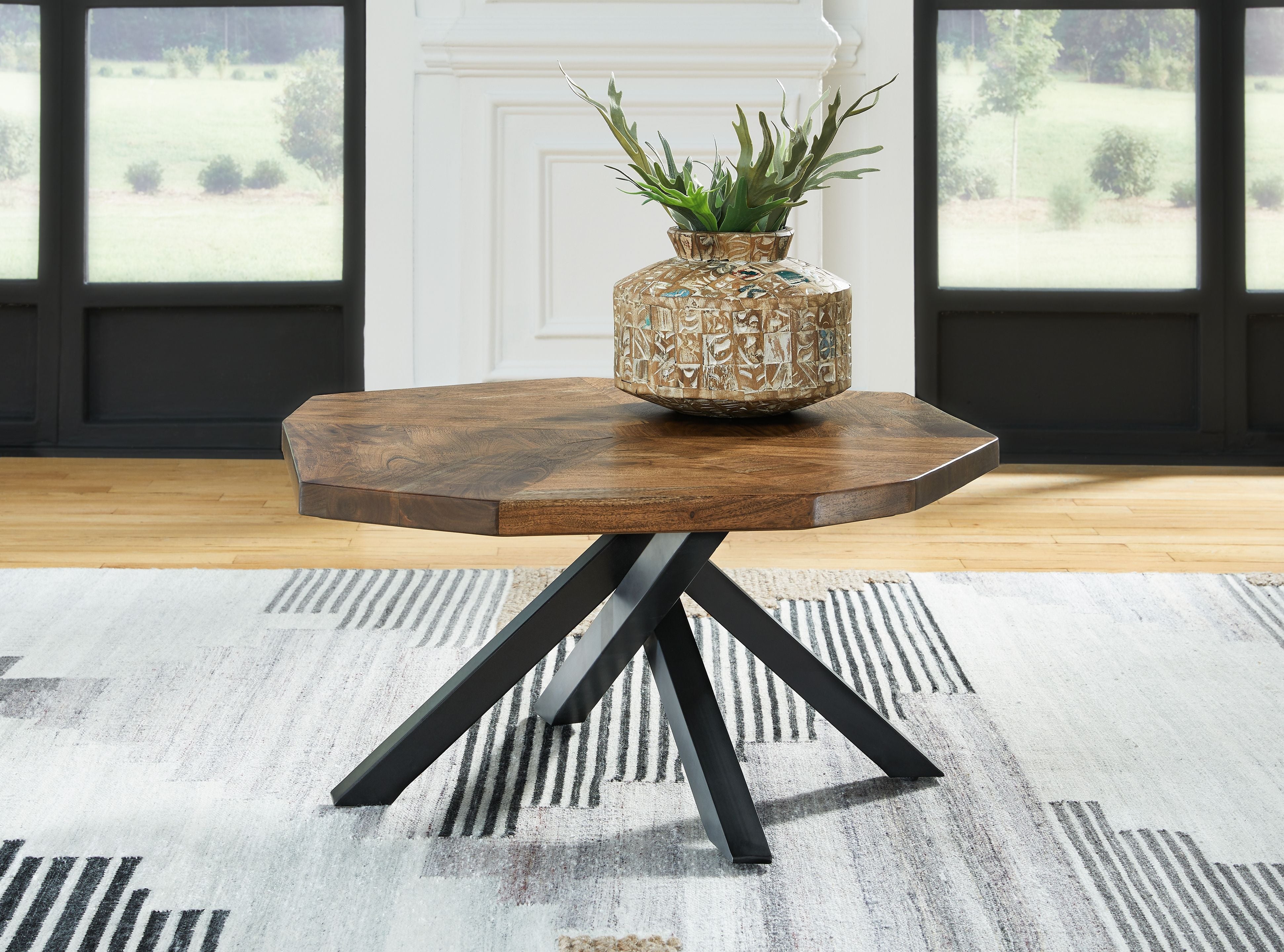 Haileeton  Brown / Black - Oval Cocktail Table