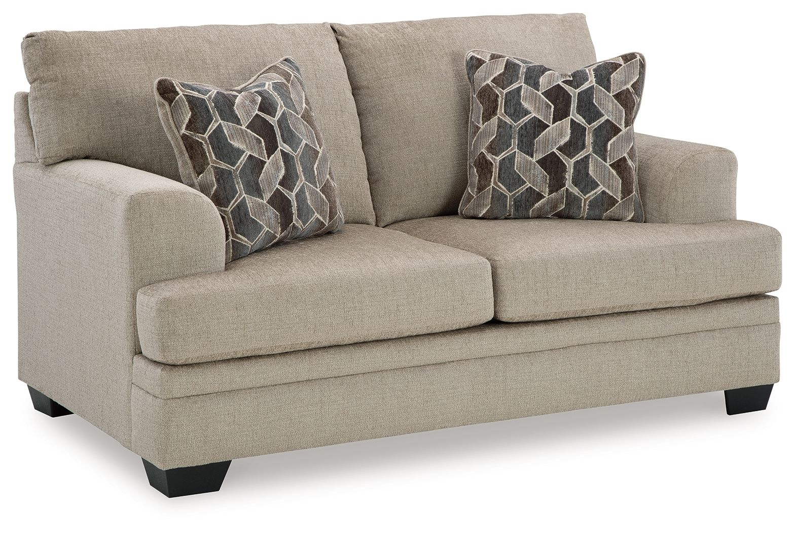 Light beige fabric loveseat with two geometric patterned throw pillows
