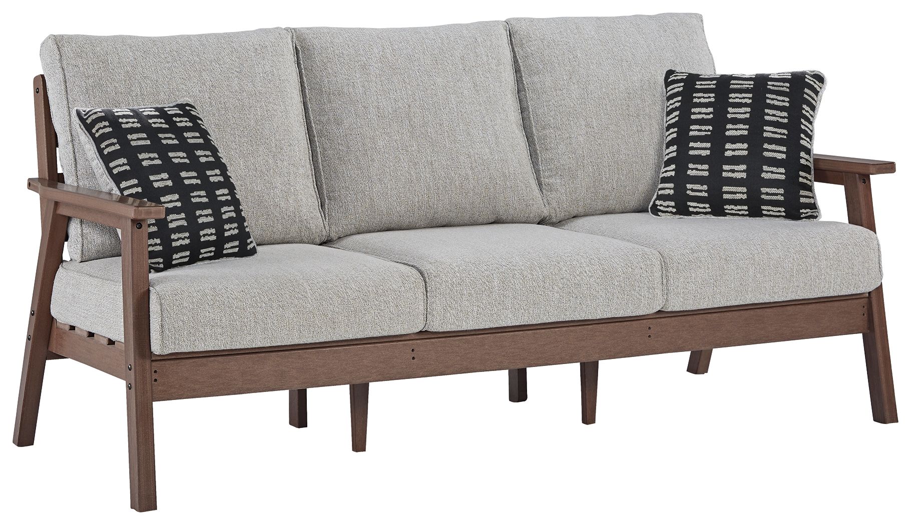 Grey upholstered sofa with two black-and-white patterned throw pillows