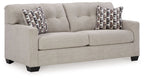 Pebble sofa sleeper with two patterned throw pillows and wide padded arms
