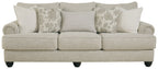 Fog three-seat sofa with light upholstery, bolster and patterned accent pillows, dark legs