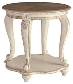 Round end table with brown top and distressed white turned legs