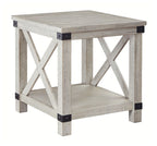 Whitewashed rectangular end table, X-frame sides, lower shelf, dark corner brackets
