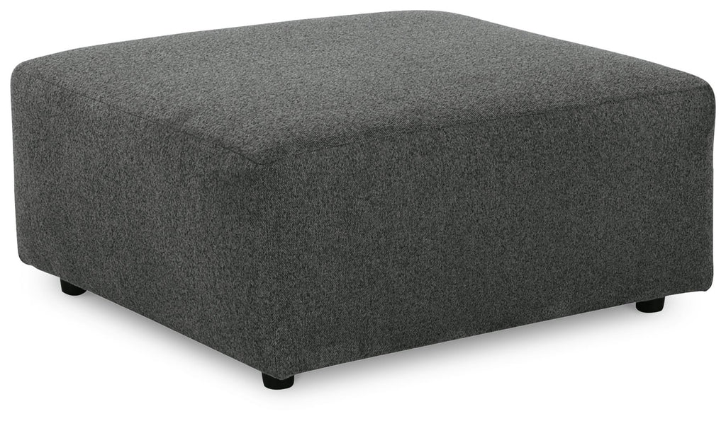 Oversized accent ottoman in dark gray textured fabric with short legs