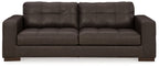 Dark brown fabric sofa with tufted back and two seat cushions