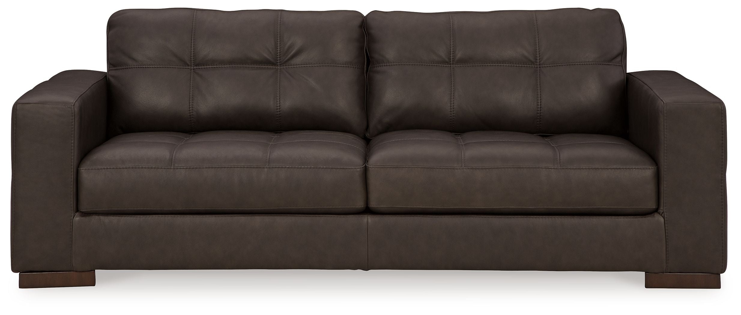 Dark brown fabric sofa with tufted back and two seat cushions