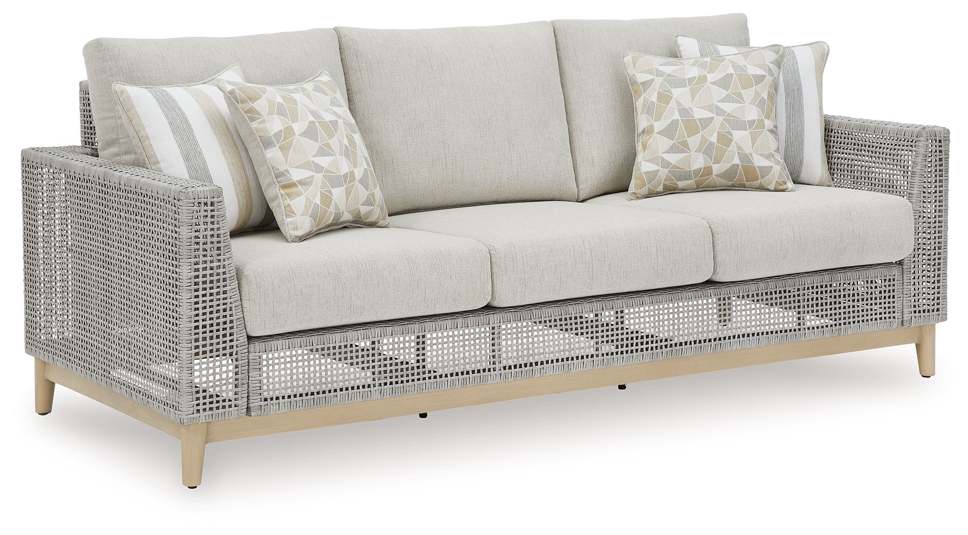 Gray woven sofa with cushions, striped and triangle-pattern pillows