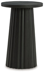 Black round accent table with fluted pedestal legs
