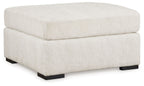 Ivory oversized accent ottoman with square upholstered top and black legs