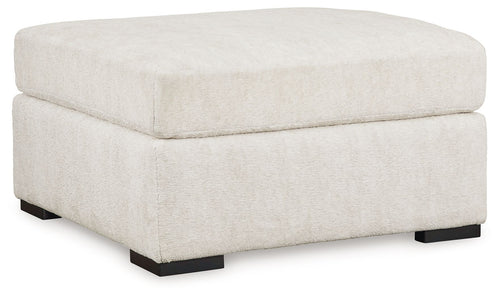 Ivory oversized accent ottoman with square upholstered top and black legs