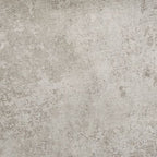 Light brown round tabletop with speckled wood-grain texture