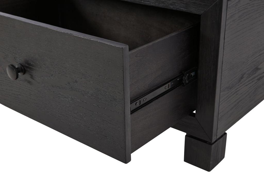 Cocktail table drawer open showing dark interior with drawer slides and pull knob