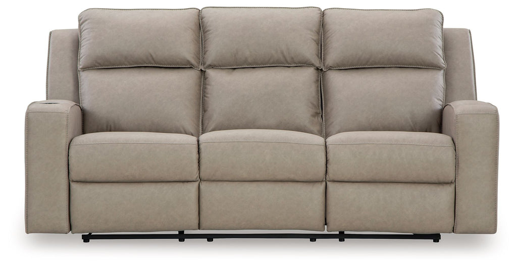 Pebble recliner sofa with three padded seats and cushioned arms