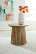 Light brown round accent table with vase on top