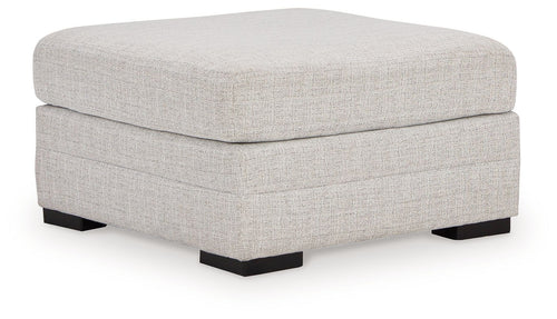 Stone oversized ottoman with upholstered square seat and block legs