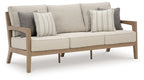 Beige fabric sofa with two striped throw pillows and matching back cushion, wooden arms