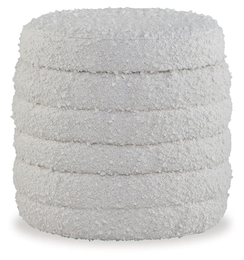 Ivory storage ottoman with quilted fabric sides and flat top lid