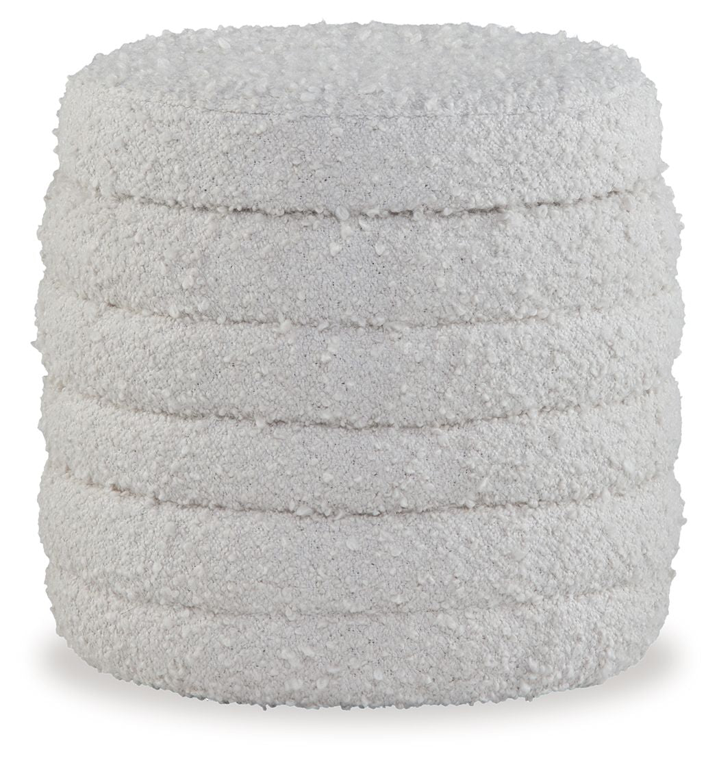 Ivory storage ottoman with quilted fabric sides and flat top lid