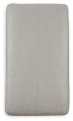 Pearl silver ottoman cover with vertical seam detail