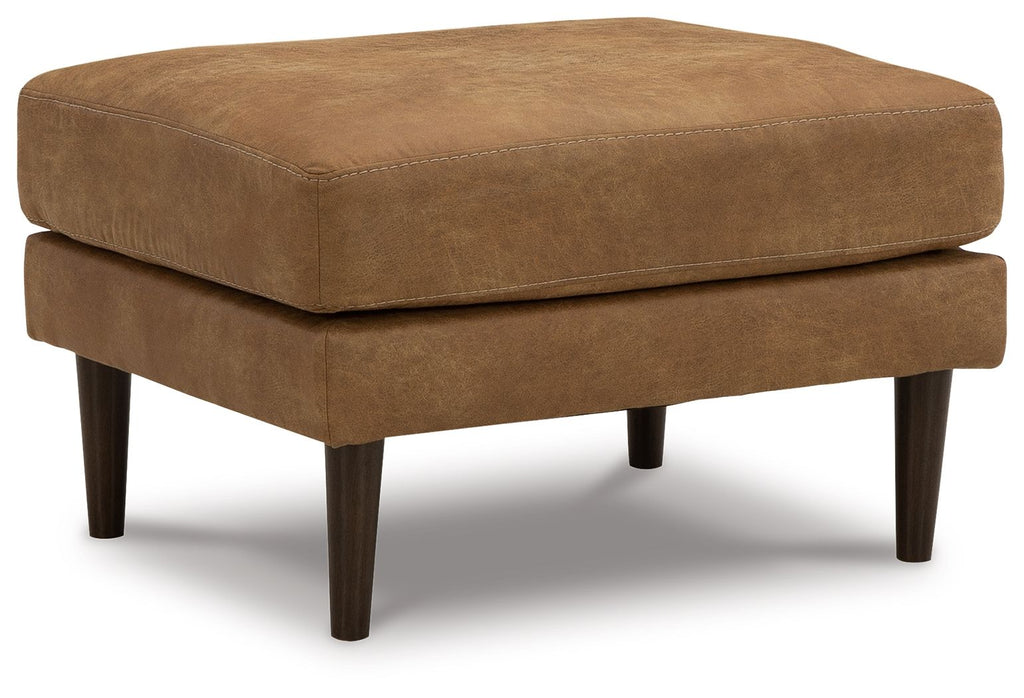 Caramel upholstered ottoman with tufted seat and dark wooden legs