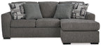 Pewter fabric sofa chaise with chaise ottoman, three back pillows and two patterned throws