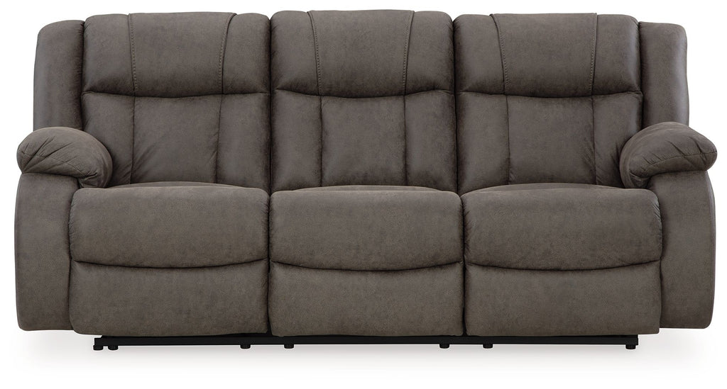 Gunmetal reclining sofa with padded armrests and three seat cushions