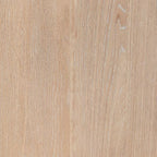 Light brown wood-grain tabletop surface closeup
