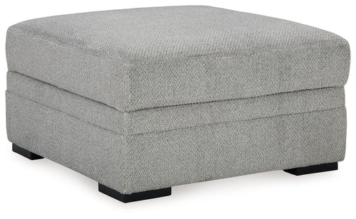 Cement gray fabric storage ottoman with hinged top and black feet
