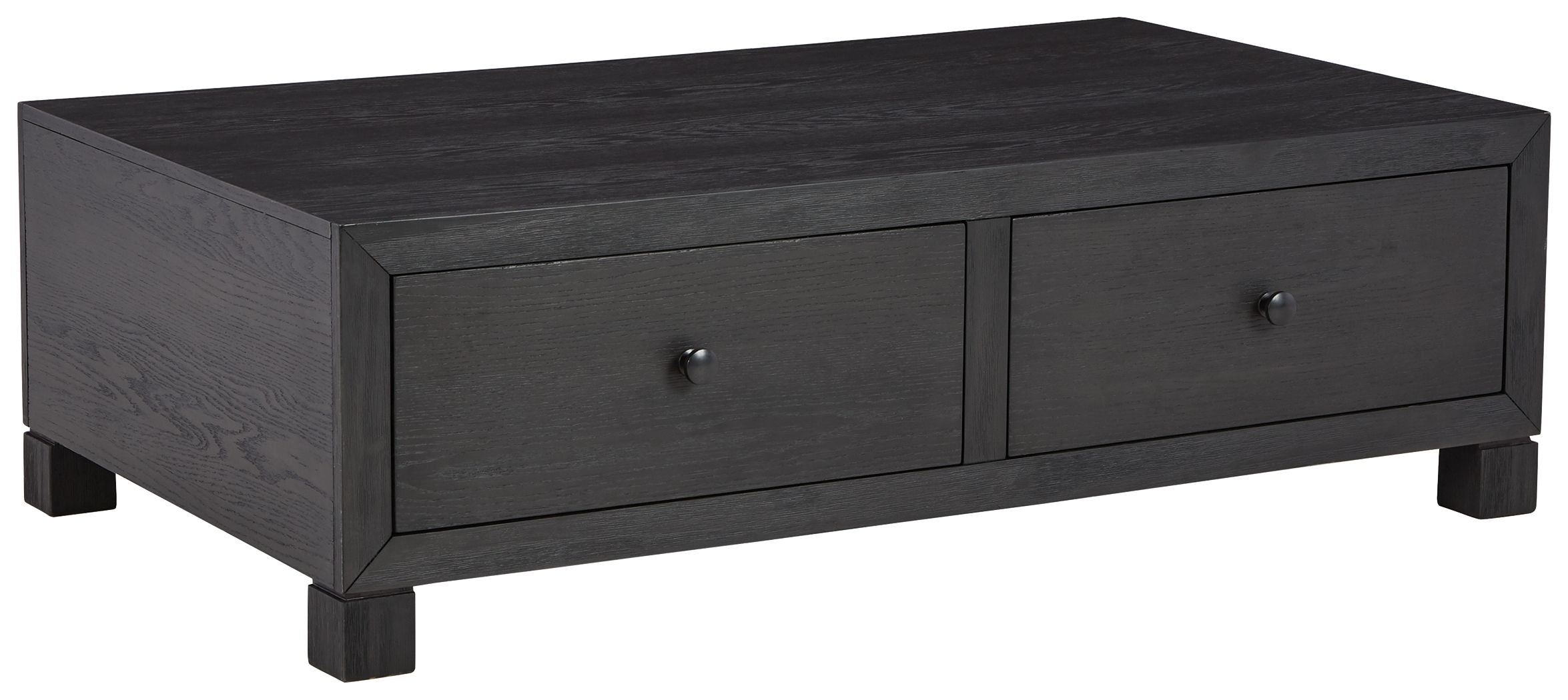 Dark wood cocktail table with storage drawers, two front drawers and block feet