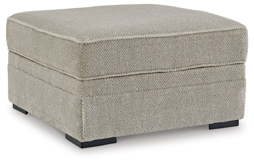 Light beige woven storage ottoman with hinged top and black legs