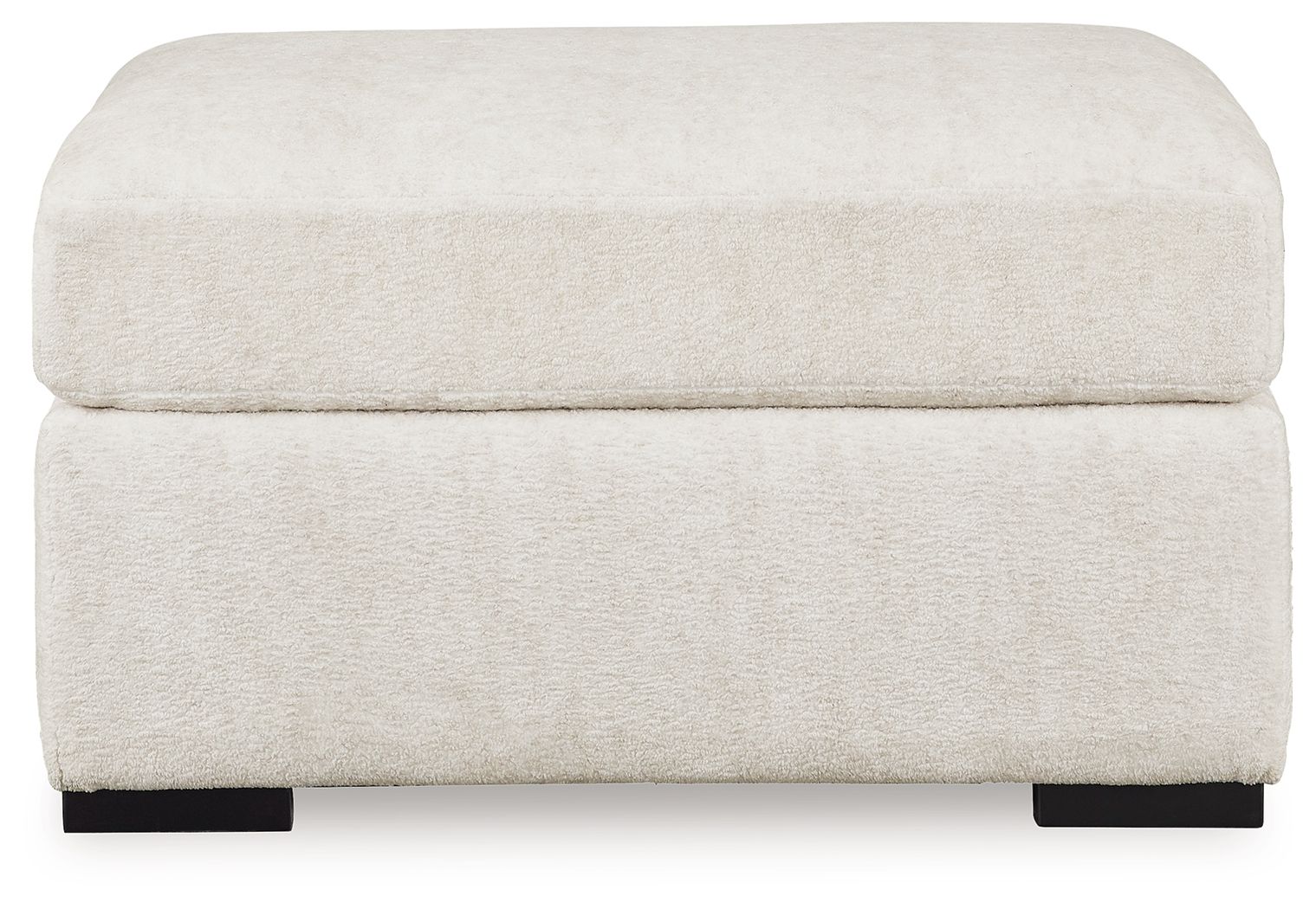 Ivory oversized accent ottoman with rounded top and fabric sides, black legs
